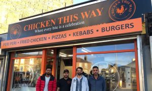 Chicken This Way owner Muhammad Usman, far right, with staff outside the new shop. Image: James Simpson/DC Thomson