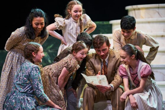 To go with story by Rebecca Baird. Xmas show roundup 2024 Picture shows; Christian Edwards as Max Detweiler; Kirsty Findlay as Maria Rainer with the Von Trapp children. . The Sound of Music, Pitlochry Festival Theatre. Supplied by Image: Fraser Band Date; 20/11/2024