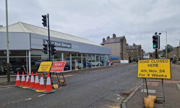 West Queen Street has been closed at Claypotts Road.