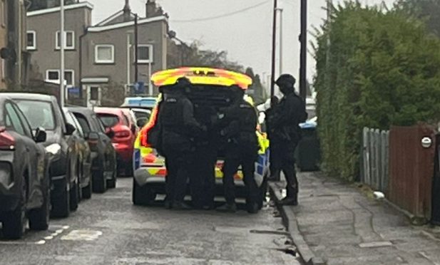 Riot police on Cluny Terrace, Letham, Perth