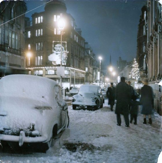 The snow and festive decorations in High Street in 1961. 