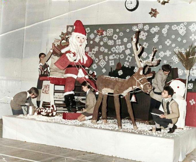 Dens Road Primary pupils working on an eight-foot-high model of Santa Claus in 1971.