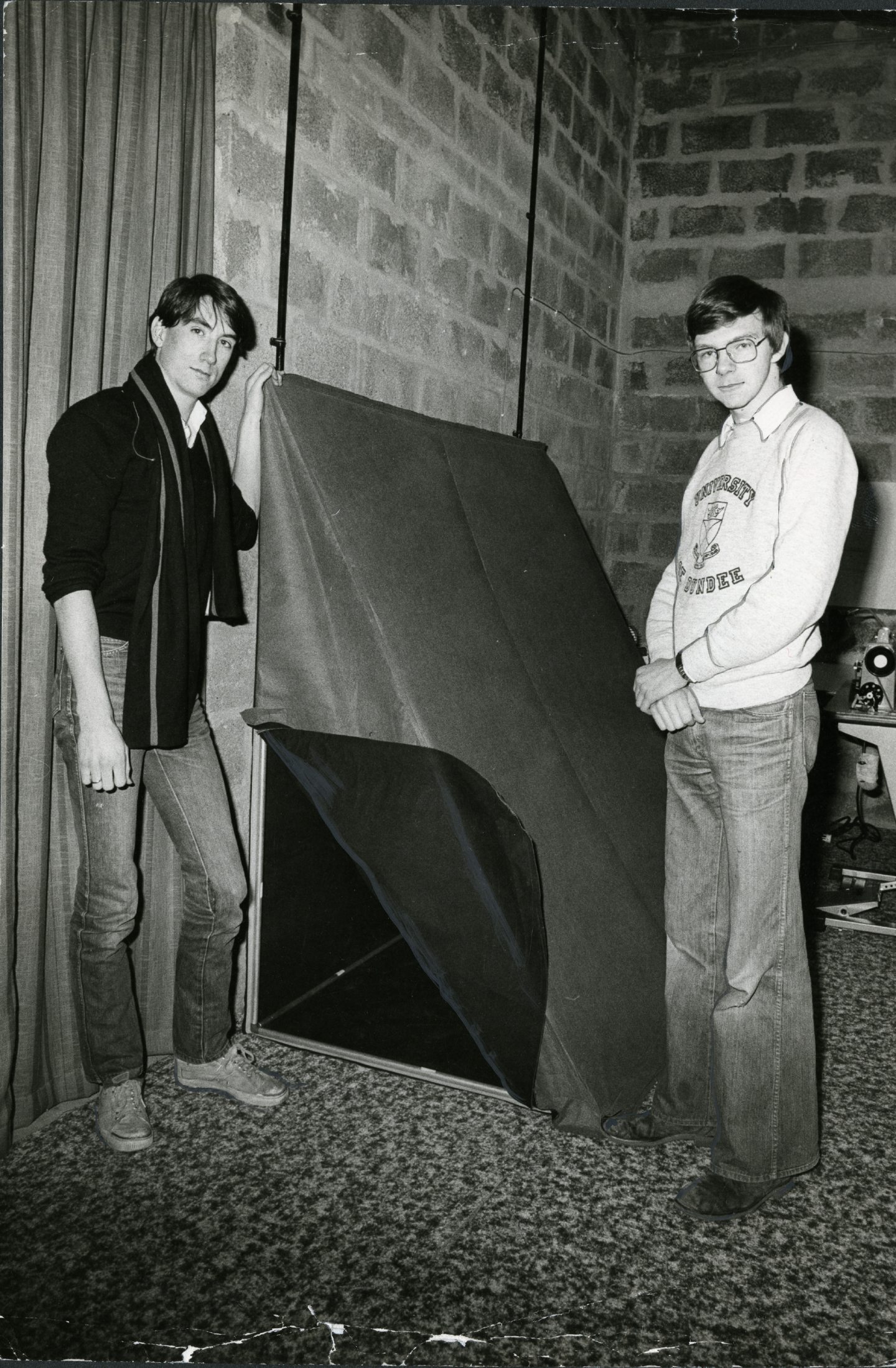 John Holland and Andrew Cameron pictured beside the warfare survival shelter in 1981. 