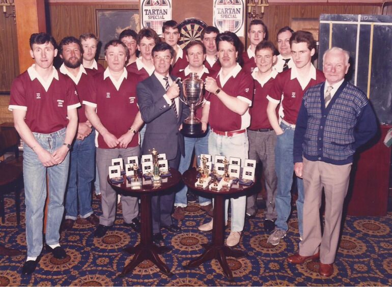 Super League trophy winners pose with the silverware in April 1989