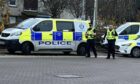 Police arriving at Glenrothes bus station.