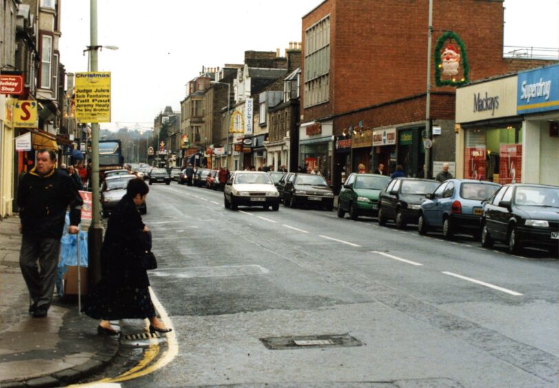 Cars, shops and people make for a busy scene in Brook Street in Broughty Ferry in 1999. 