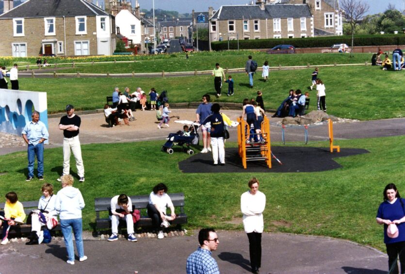 Children of all ages enjoying the play park.