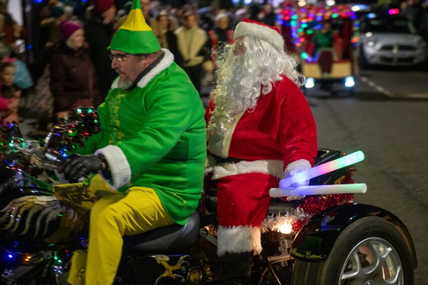 Santa arriving at Carnoustie Christmas lights event.