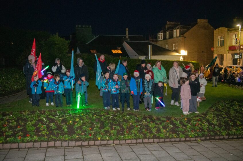 Scouts gather at Carnoustie Christmas lights event.