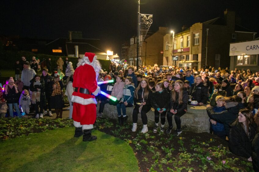 Crowds at Carnoustie Christmas lights.