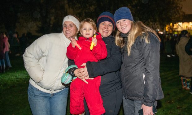 Skye Lilburne, Cameron Wilson, Laura Wilson and Lilla Attenborough, have fun at Cupar fireworks display on Friday.