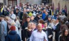 Crowds outside the Caird Hall, City Square, Dundee, in November for Dundee University's winter graduations. Image: Kim Cessford / DC Thomson