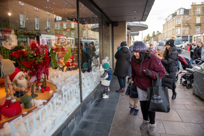 Excited shoppers outside the Brook Street store. 