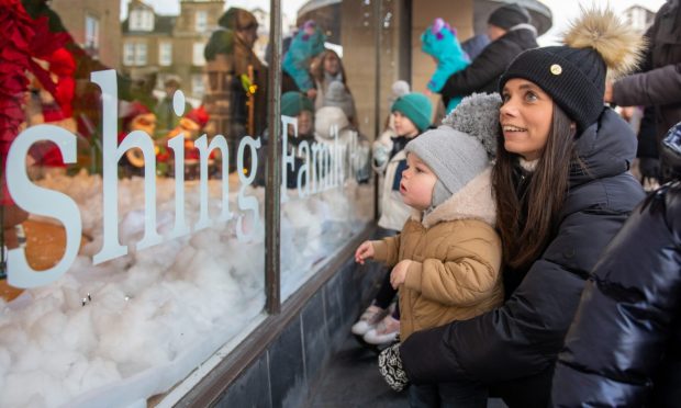 One-year-old Harvey Reilly and his mum, Alison Reilly, enjoy a first look at this year's Gillies display. Image: Kim Cessford/DC Thomson