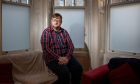Samuel Mutch inside his Dundee flat.