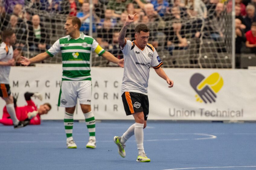 Tournament top scorer Swanson celebrates the first of his FIVE goals in three games, with the opener vs Celtic