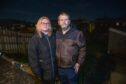 Vicky and Arthur Frater in their garden in the dark