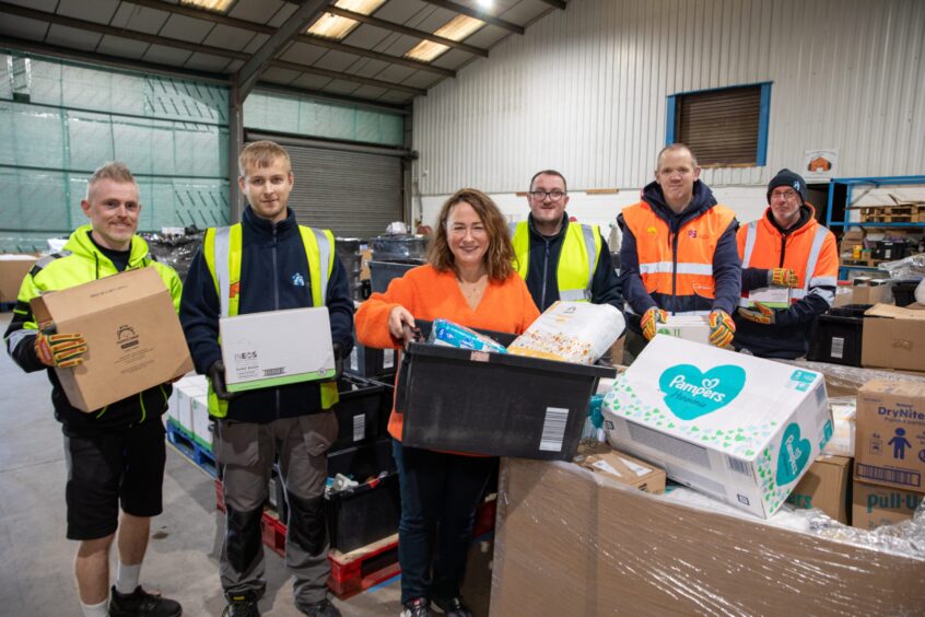 Actor Arabella Weir, who is also involved with the project, joined staff and volunteers in helping to sort out donations.