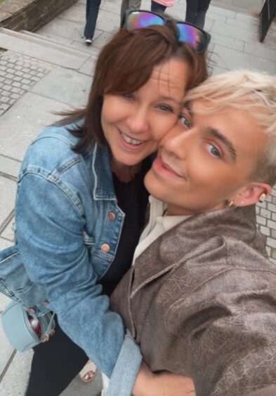 Marc with his mum Julie, who donated her kidney to him. 