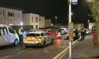 Police on Dryburgh Street during the incident. Image: Andrew Robson/DC Thomson