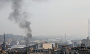 The plume of smoke can be seen above Dundee city centre. Image: Mark Asquith/DC Thomson