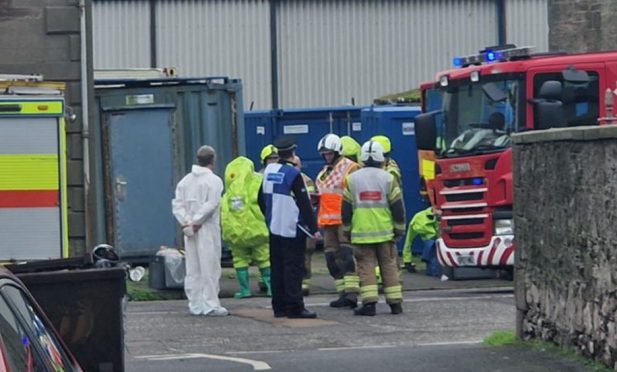 Emergency workers in hazmat suits at Montrose docks. Image: Andrew Robson/DC Thomson