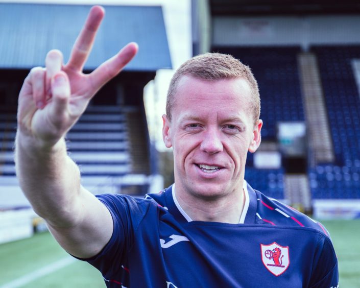 Scott Brown holds up two fingers to celebrate his new contract at Raith Rovers.