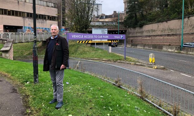 Norrie Bland outside the Wellgate Shopping Centre entrance. Image: James Simpson/DC Thomson