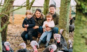 The Sands family with their turkeys on Oakfield farm.