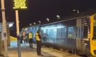 Officers on the platform at Cowdenbeath Railway Station.