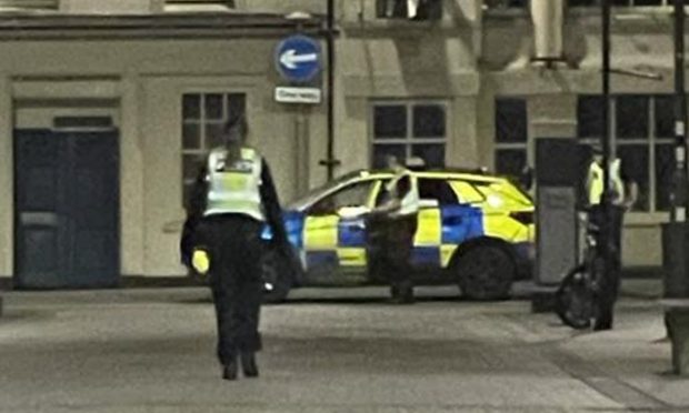 Police in Perth city centre after the fire outside the shop. Image: Supplied