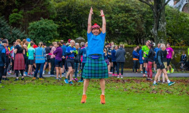 Steve Bonthrone (one of the Parkrun directors) makes a convincing number 11 for their 11th birthday. Image: Steve MacDougall/DC Thomson