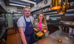 Jack Coghill and Rachel with their finished dish of roasted monkfish in the kitchen at Jack 'O' Bryan's in Dunfermline.