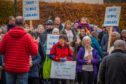 Group of protesters with Save Scone library placards