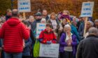 Group of protesters with Save Scone library placards