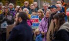 Crowd of people, some with Save Scone library placards