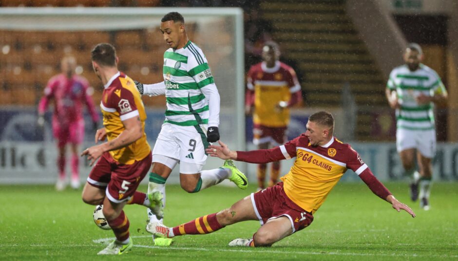 Motherwell's Liam Gordon challenges Adam Idah.