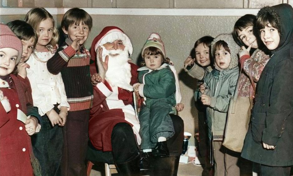 Children with Santa at the Douglas and Angus Community Centre Fayre in 1976. Image: DC Thomson.