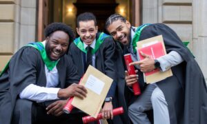 William Bellow, Ahmed Rahal and Aleas Gitton graduate together at Abertay University Graduation Day. Image: Steve Brown/DC Thomson