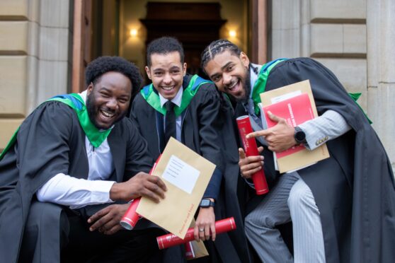 William Bellow, Ahmed Rahal and Aleas Gitton graduate together at Abertay University Graduation Day. Image: Steve Brown/DC Thomson