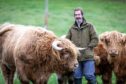 James Oswald with his fold of Highland cows in Fife. Image: Steve Brown/DC Thomson.