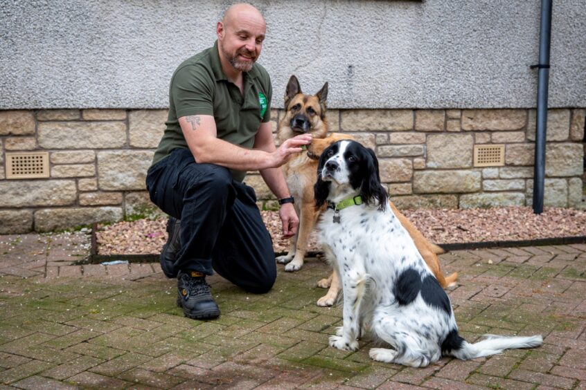 Fife veteran Mick with his dogs Sam, Bonnie and Sascha