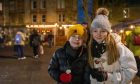 Cal (7) and Corrie (12) Monaghan enjoying their time at Dundee West End Christmas Fortnight launch. Image: Steve Brown/DC Thomson.