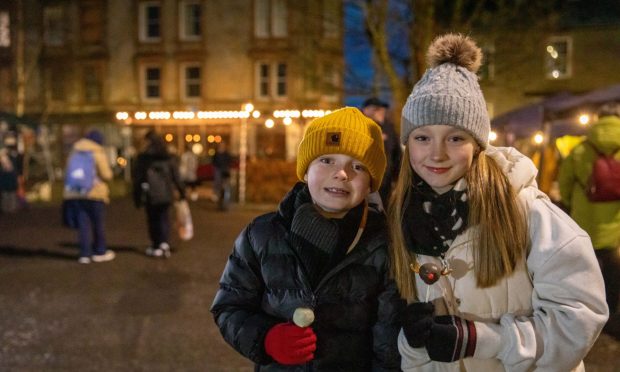 Cal (7) and Corrie (12) Monaghan enjoying their time at Dundee West End Christmas Fortnight launch. Image: Steve Brown/DC Thomson.