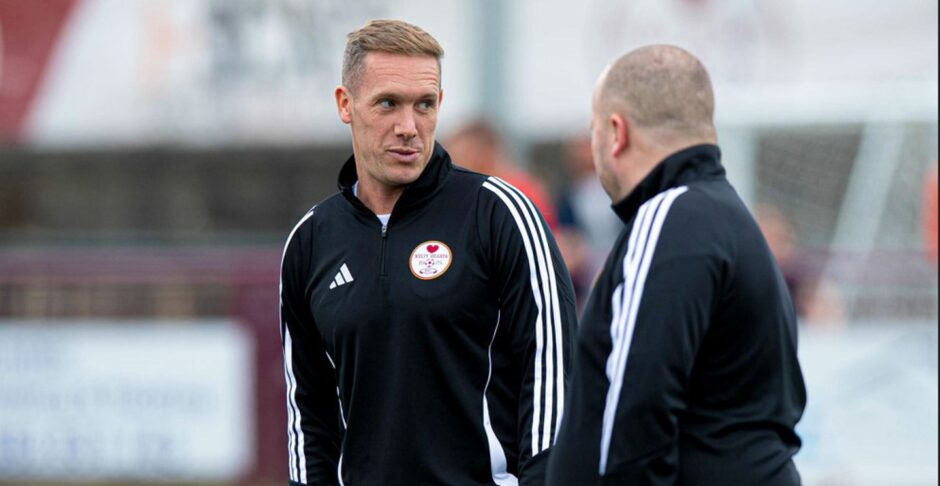 Kelty boss Michael Tidser, left, wants Adams to play out from the back regardless of pressure