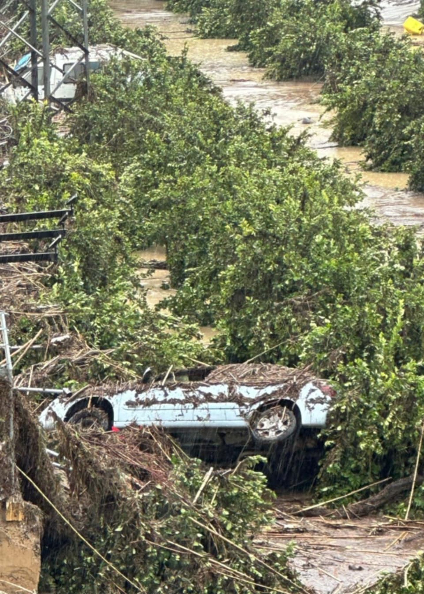 A car swept away during the floods in Spain. 