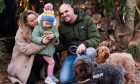 Rachel and her husband Kieran Andrews with their daughter Lily and dogs Pepper and Phantom at the Greenman's den. Image: Laura Mincher