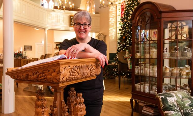 The Culdee owner Gill Noble stands at the old church pulpit which now sits at the entrance to her cafe in the renovated St Rules church in Monifieth