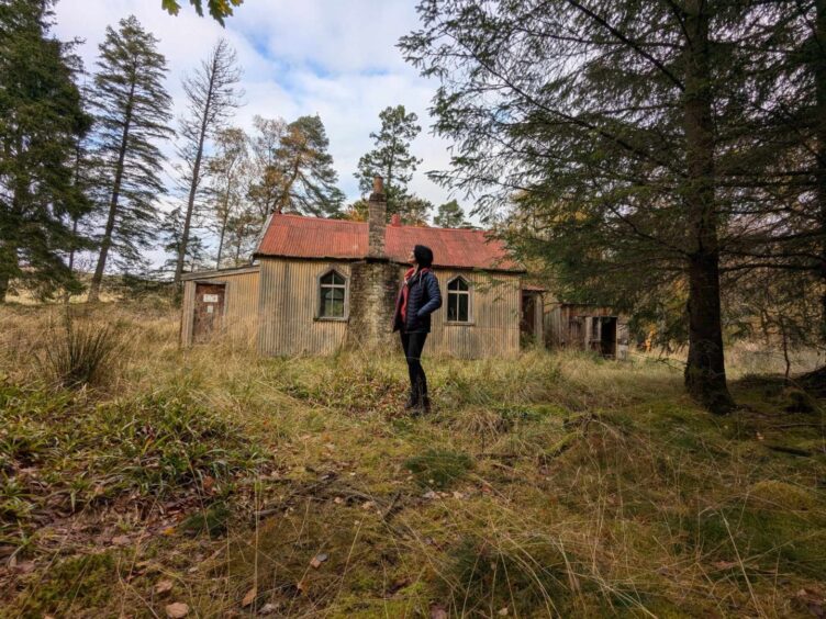 Gayle checks out the derelict Tin Kirk. Image: Gayle Ritchie.