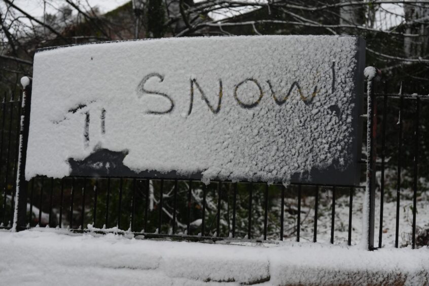 Snow, written in a road sign in Stirling.